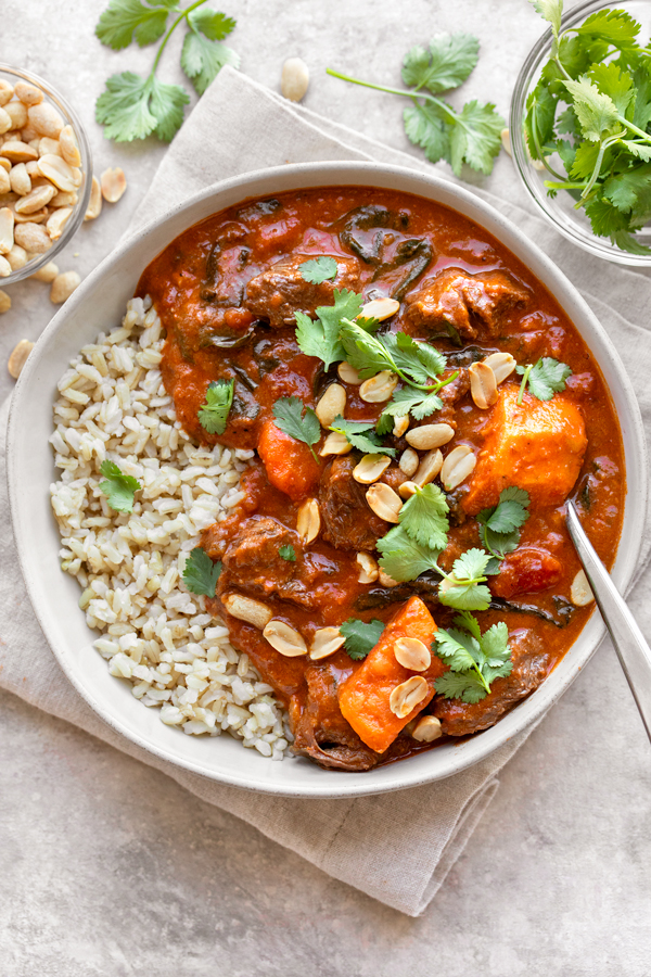 Overhead shot on a bowl of African Peanut Stew over rice | thecozyapron.com