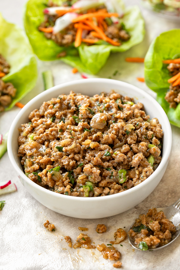 A bowl of the pork filling for Pork Lettuce Wraps | thecozyapron.com