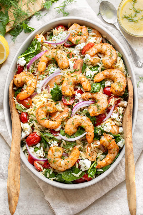 A large serving dish of Shrimp and Orzo Salad | thecozyapron.com
