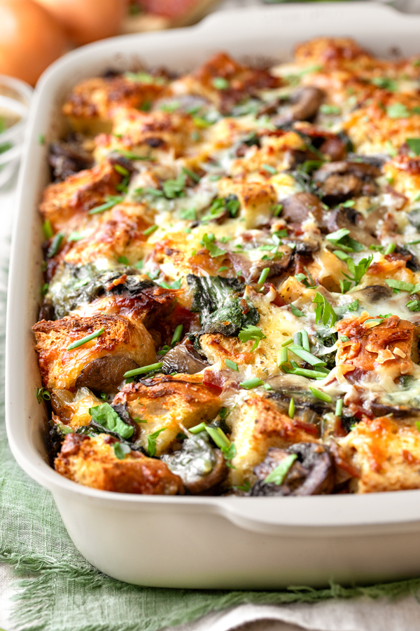 Breakfast Strata in a baking dish, fresh out of the oven | thecozyapron.com