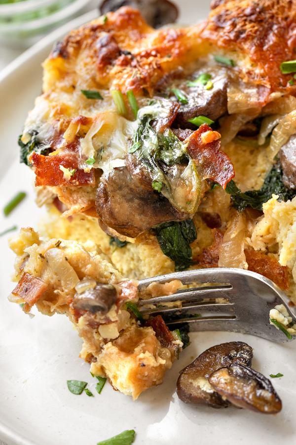 A forkful of warm Breakfast Strata | thecozyapron.com