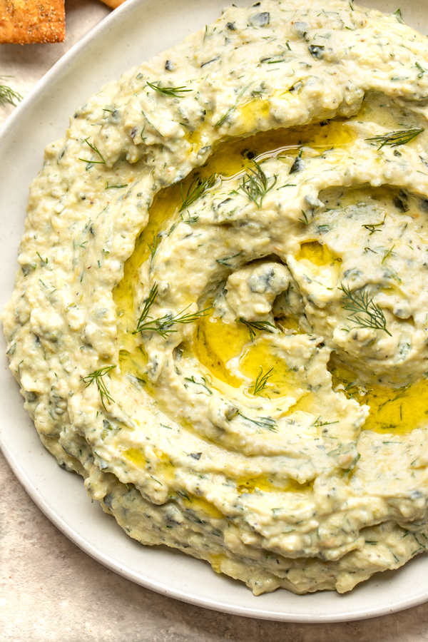 Overhead and closeup on Roasted Zucchini Dip in a serving dish | thecozyapron.com