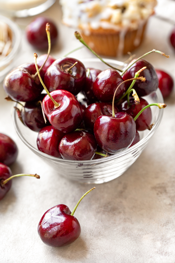 A little bowl of fresh cherries for homemade cherry muffins | thecozyapron.com