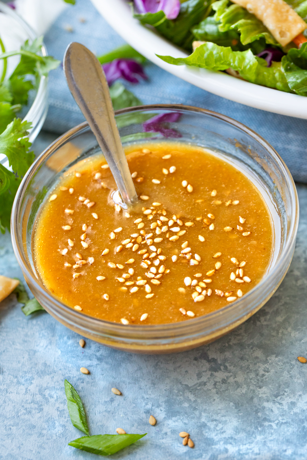 Closeup on a ramekin of Homemade Sesame-Ginger Dressing for Chinese Chicken Salad | thecozyapron.com