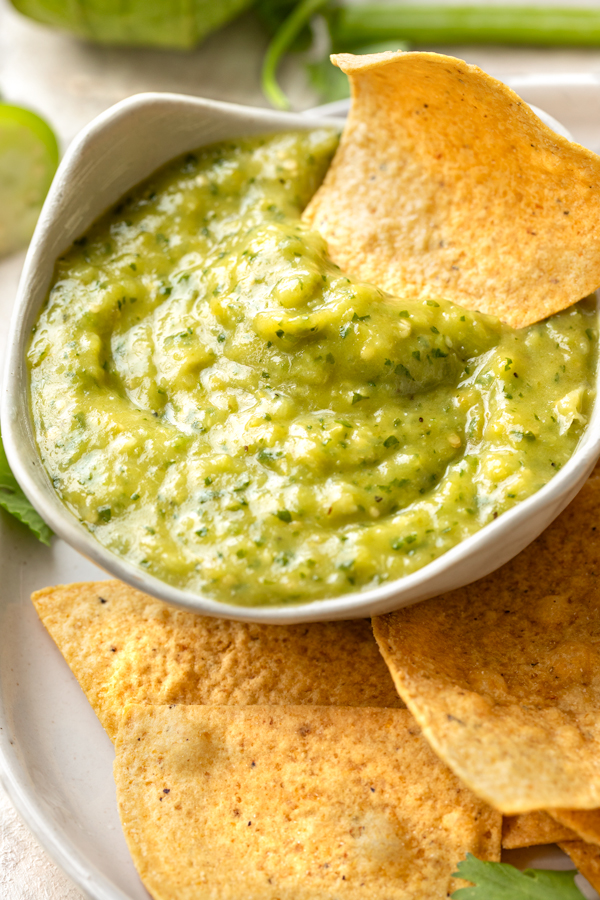 Closeup on a ramekin of fresh Salsa Verde with Corn Chips | thecozyapron.com