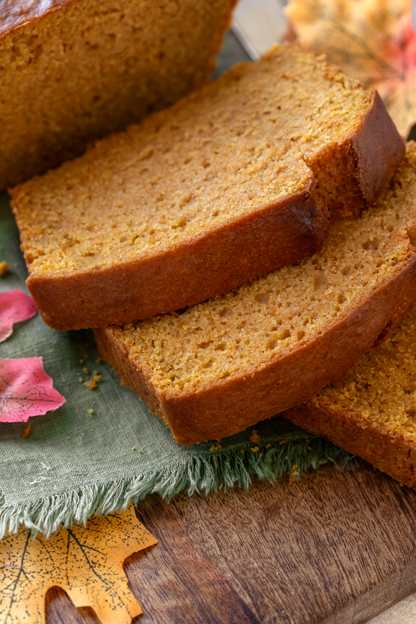 Closeup on a few slices of warm Maple Sweet Potato Bread | thecozyapron.com